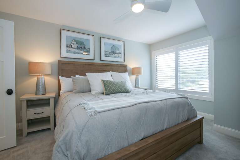 Master Bedroom on the upper level features a king sized bed, private bath and flat screen TV.