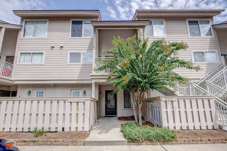 Front Exterior Picture and Courtside 42 is located on upper level.  