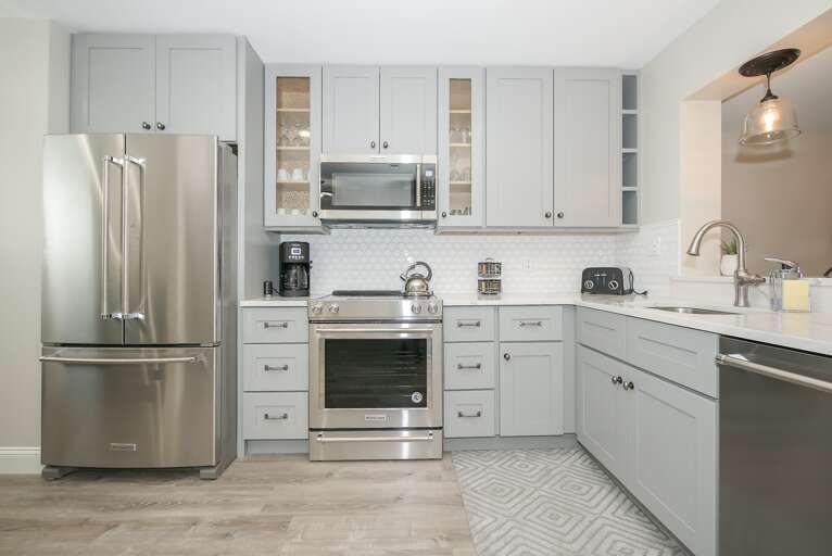 This is a clean, updated kitchen with stainless steel kitchen aid appliances. 