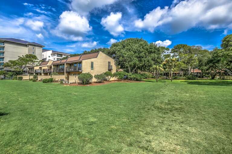 Lovely grounds of the Hilton Head Beach Villa Complex in the springtime showing new growth on ancient Oak Trees. 