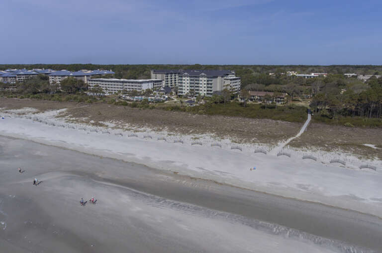The wide sandy beach and the beautiful Atlantic Ocean in front of the Hilton Head Beach Villa Complex.