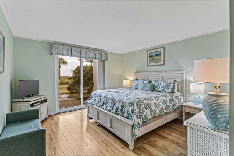 Newly painted and renovated master bedroom with king sized bed and new furniture and bedding.  Plenty of storage.  