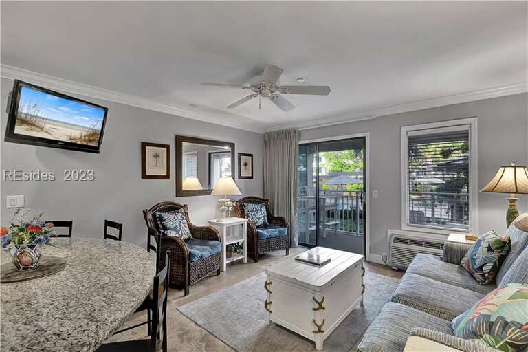 Interior Living Space With Furniture And Television