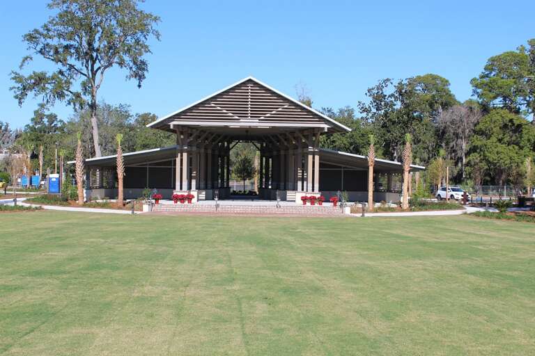 Pavilion In Park With Expansive Green Lawn