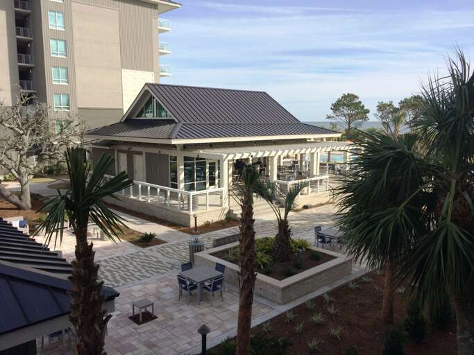 Dine at the Oceanside Bar & Grill for breakfast, lunch & dinner part of the Hilton property open to public.