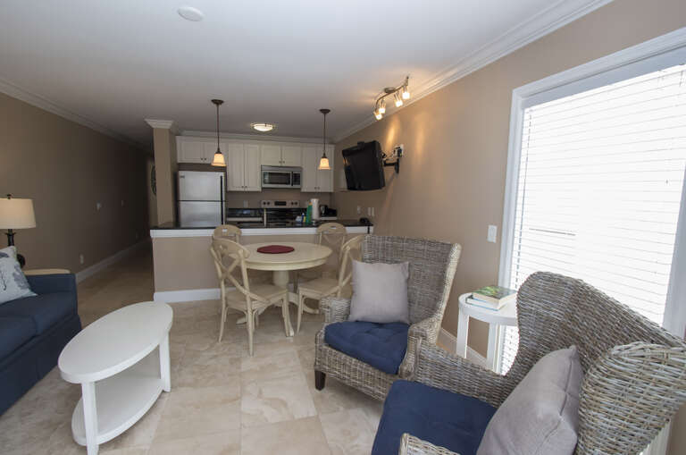 The newly renovated completely furnished Kitchen features all stainless steel appliances, beautiful granite counters and kitchen island with seating for two. Dining table seats four. Living room offers comfy sofa bed, wall mounted smart flat screen T.V. a