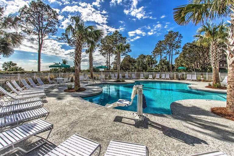 Here’s the new Beachfront pool completed in 2015 with handicap lift. . Beautiful palm trees, tables with seating and umbrellas to relax and enjoy a view of the amazing Atlantic Ocean waves.