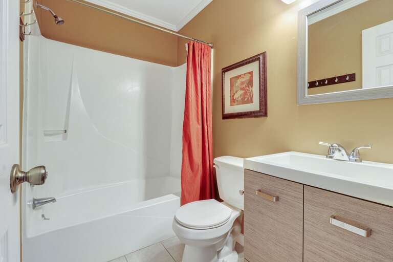 Renovated bathroom with shower/tub combination 