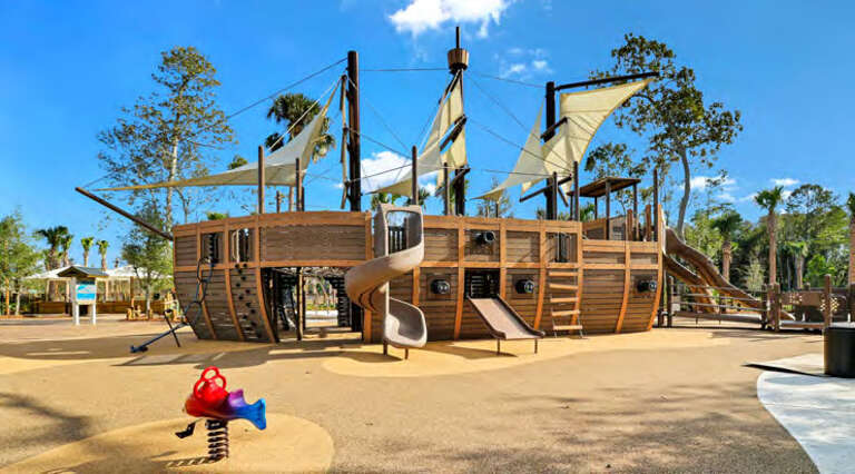 Pirate Ship Playground Under Sunny Skies At A Vacation Rental Park