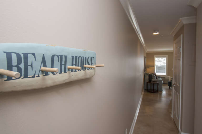 Entrance to beachfront villa Ocean Dunes 211. A great place to hang your towels, after a day at the beach or pool.