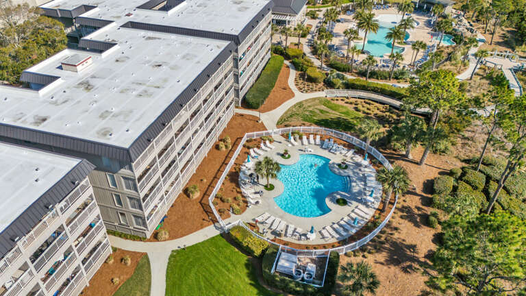 Aerial View Of A Building Complex With Pools Aerial View Of A Building Complex With Pools
