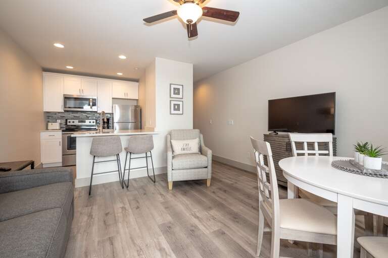 Interior Of A Furnished Living Space With Kitchen And Dining Area Interior Of A Furnished Living Space With Kitchen And Dining Area