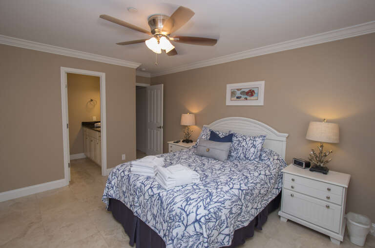 The Master Bedroom in Ocean Dunes features a Queen sized bed and a private Bath.