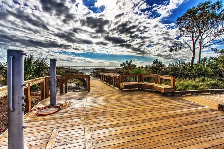 Beachside showers on beach walkway.