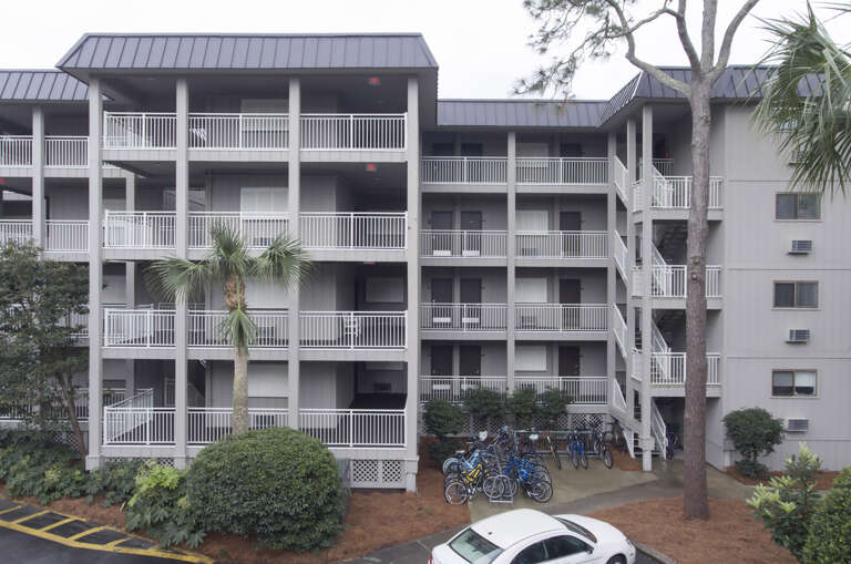 Ocean Dunes parking is convenient to property.
Building Exterior from south forest beach drive.