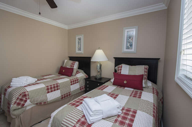 Twin beds in guest bedroom.