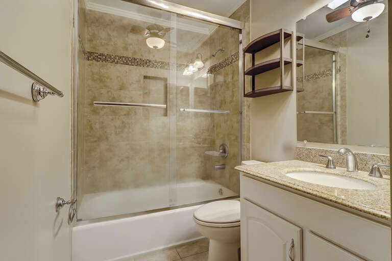 This is the Master Bathroom with combo tub / shower. 