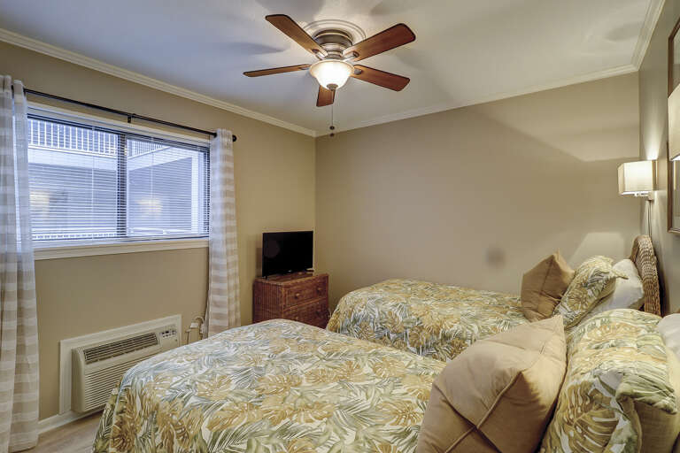 Twin beds in guest bedroom.