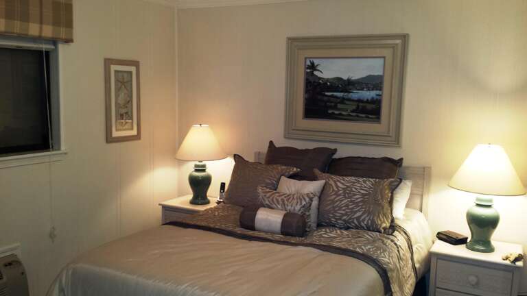 The master bedroom has a queen sized bed with new mattress and pillows.  This bedroom has direct access to a private master bathroom.  This is the perfect space to relax after a full day of Hilton Head Island fun and activity.