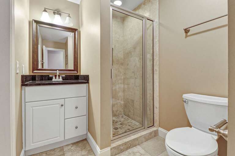Beautiful updated 2nd bathroom with tiled shower.