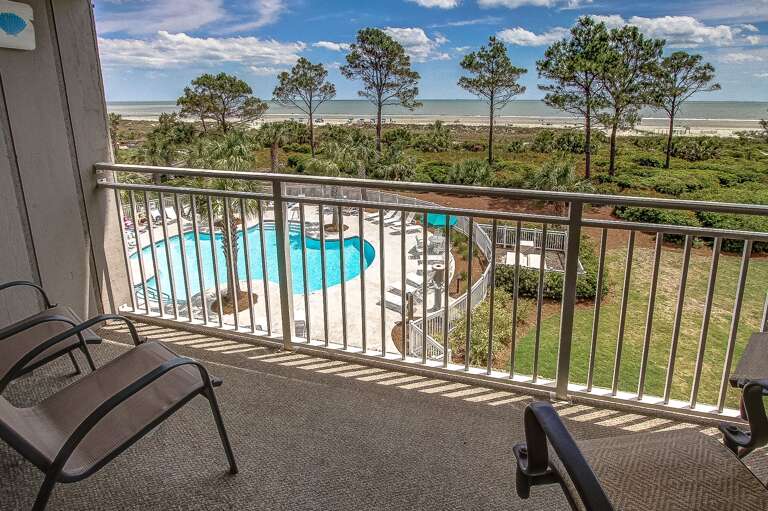View off Balcony Overlooking the Ocean and pool.