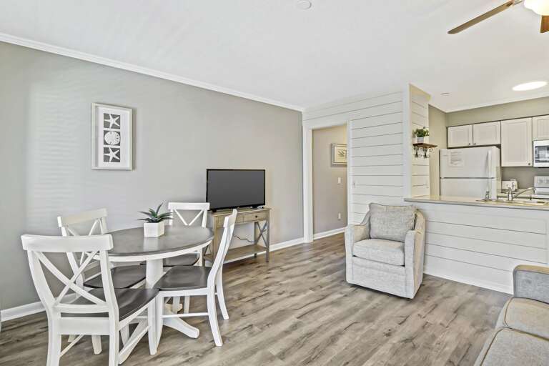 Newly dining table will be perfect place for meals and family game nights.  And check out the featured shiplap wall!