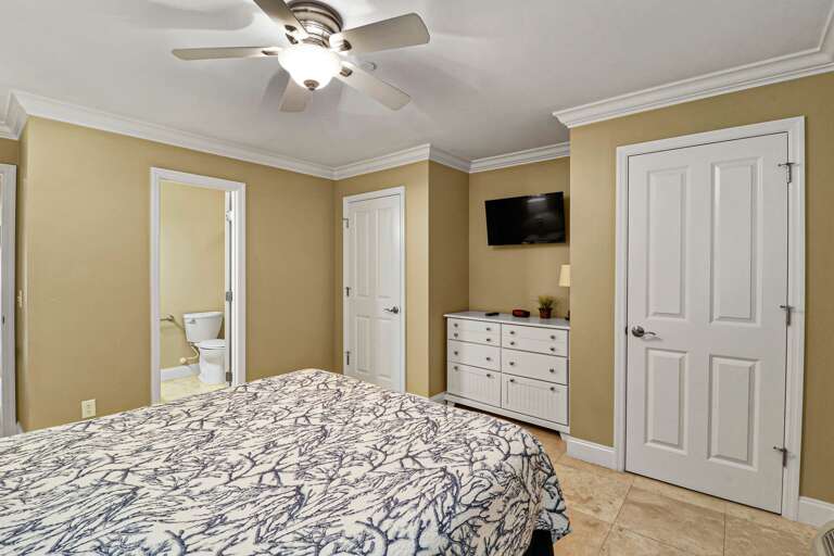 The Master Bedroom has  a  queen bed and access to private bathroom.
