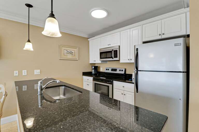Fully equipped kitchen with all stainless appliances creates a great space for daily meal prep while on vacation.
