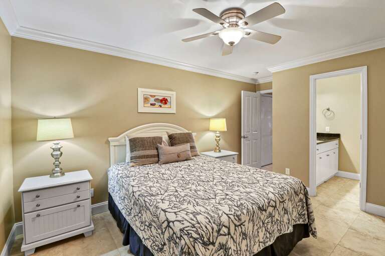 The Master Bedroom has a queen bed and access to private bathroom.
