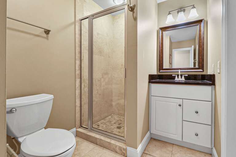 All tile bathroom with walk-in shower