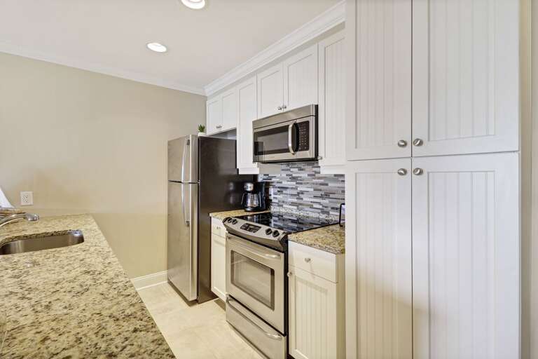 Beautiful coastal kitchen has everything you need to enjoy a beach vacation!