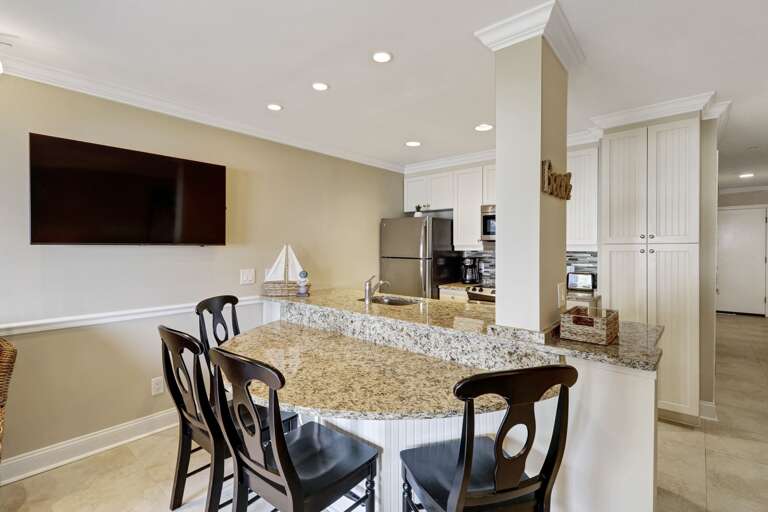 Large screen TV makes it easy to watch from anywhere in the main living area!