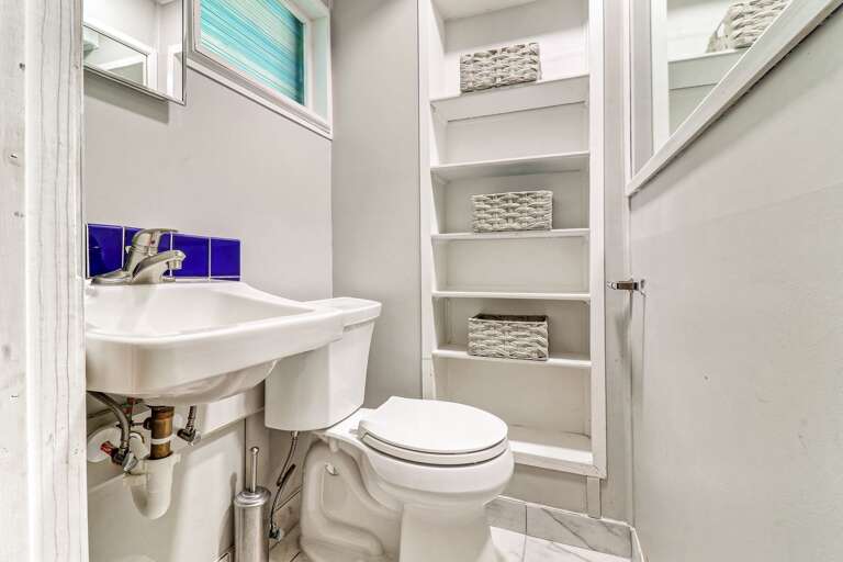 Private bathroom in lower floor of guest house