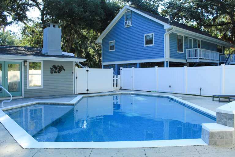 Blue Building Behind Bright Blue Pool