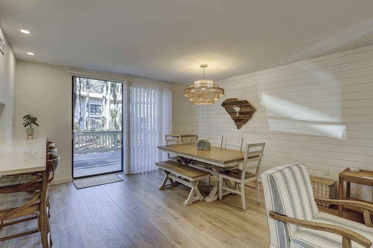 Cozy living and dining space, perfect for hanging out and enjoying a meal with friends and family.