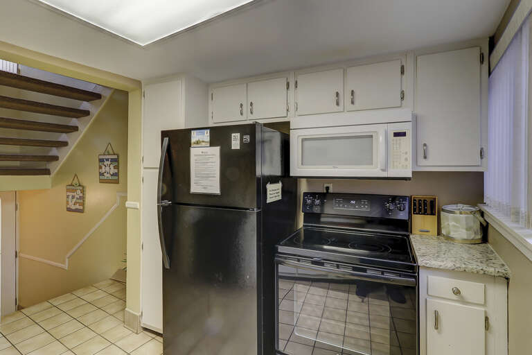 Granite counter tops in this fully stocked villa.