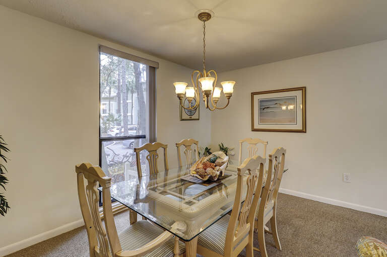 Dining and living room area has plenty of space for your family. 