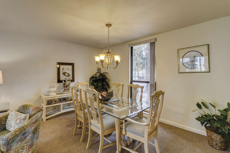Dining and living room area has plenty of space for your family. 