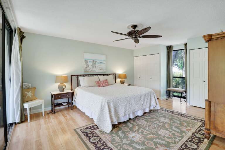 Plenty of storage and natural light in this king sized bedroom 