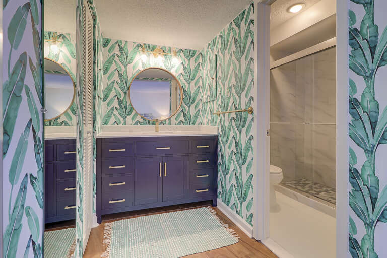 Newly renovated, coastal feel master bathroom with walk in shower. . 