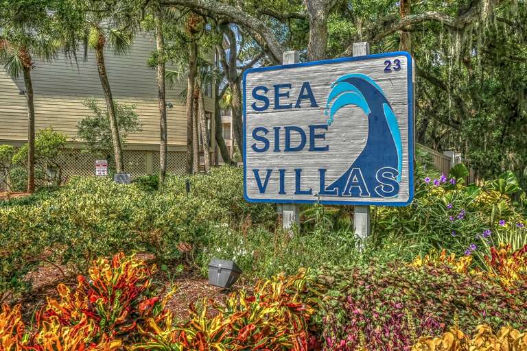 Entry sign for Sea Side Villas at 23 South Forest Beach Drive, Hilton Head Island