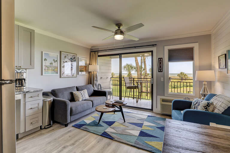 Newly furnished and bright and clean the living room has access to the balcony through sliding glass doors and a spectacular view of the Atlantic Ocean.