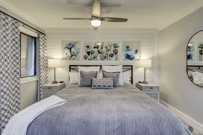 The new renovation at this condo has an open concept allowing the decorator the space to build two closets and install a king sized bed. The new renovation at this condo has an open concept allowing the decorator the space to build two closets and install a king sized bed.