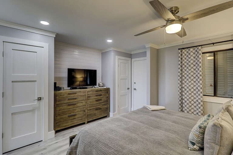 The new renovation at this condo has an open concept allowing the decorator the space to build two closets and install a king sized bed. The new renovation at this condo has an open concept allowing the decorator the space to build two closets and install a king sized bed.