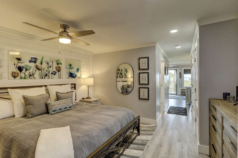 The new renovation at this condo has an open concept allowing the decorator the space to build two closets and install a king sized bed. The new renovation at this condo has an open concept allowing the decorator the space to build two closets and install a king sized bed.