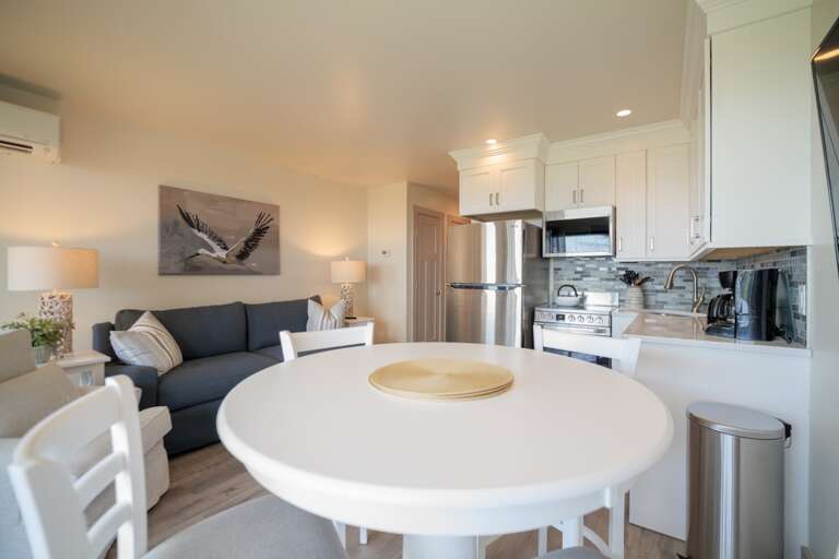 Interior Of A Vacation Rental Living Space With Kitchen