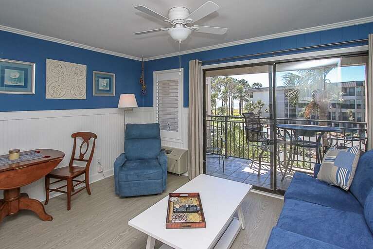 Off the Living Room is the ocean view balcony accessed through a sliding glass door.