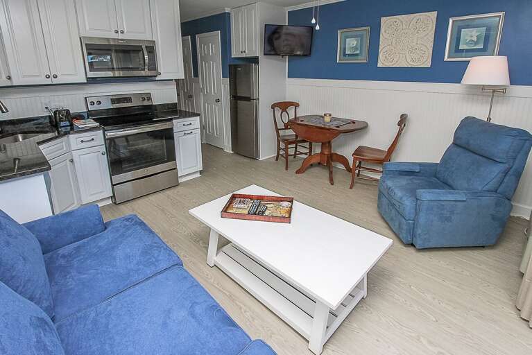 New Stainless Steel appliances and granite counter tops in the remodeled kitchen.