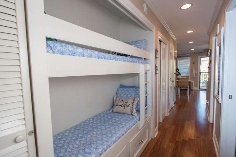 The bunk beds in the hallway are ideal for small children or your belongings.