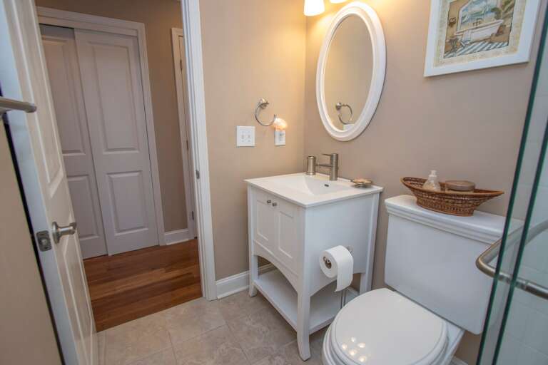The newly remodeled bathroom has tile flooring.